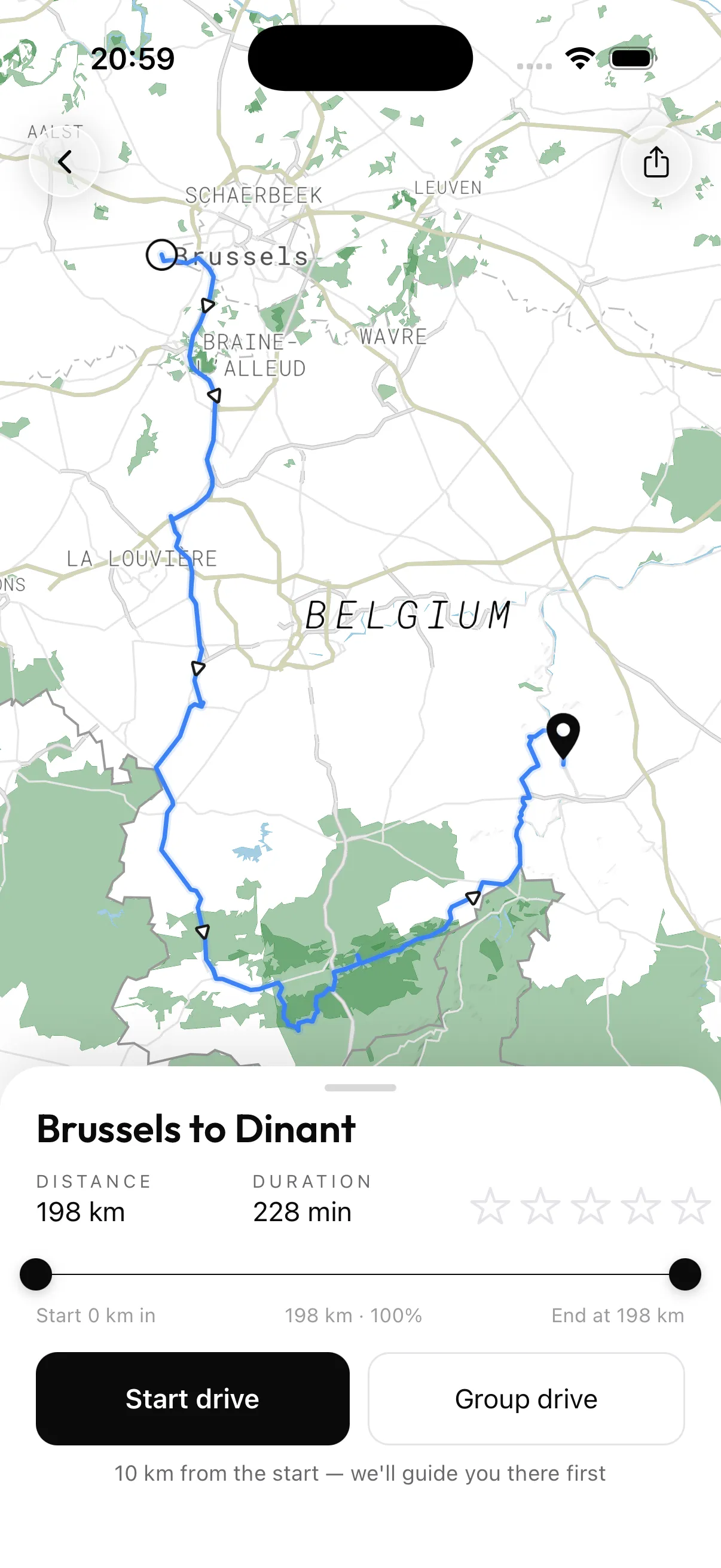 A Wheelstherapy route from Brussels to Dinant, showing the full line on the map with distance, duration and a Start drive button.